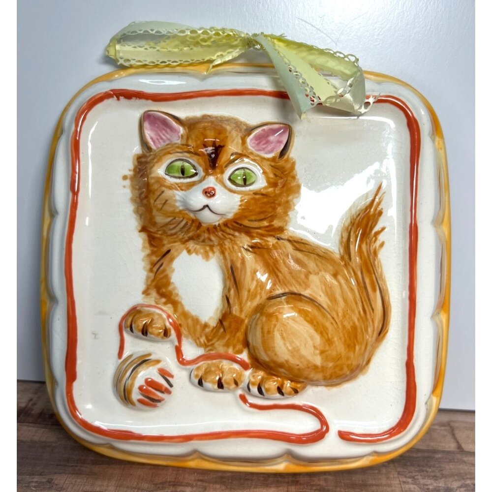 Hand-Painted Ceramic Cat-Themed Mold With Yellow Ribbon